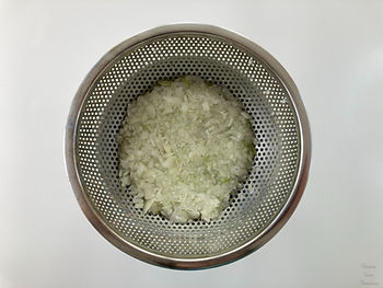 onions in a colander