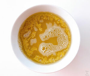 Bulgur wheat in a bowl, hot water