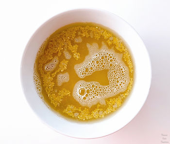 Bulgur wheat in a bowl, hot water