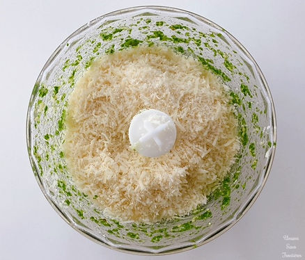 Parmesan cheese and basil sauce in food processor