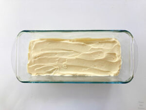 Mascarpone cream, egg whites and whisk in a bowl