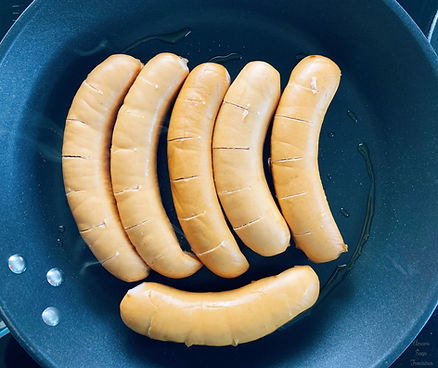 sausage on a frying pan