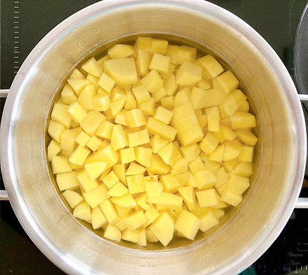 water in a pot, potatoes