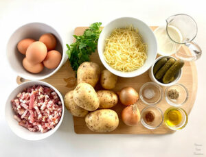 Berlin-style stir-fried potatoes, bacon, and eggs – Hoppel Poppel ingredients