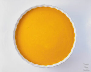 Biscuit dough and pumpkin cream in a heat-resistant dish
