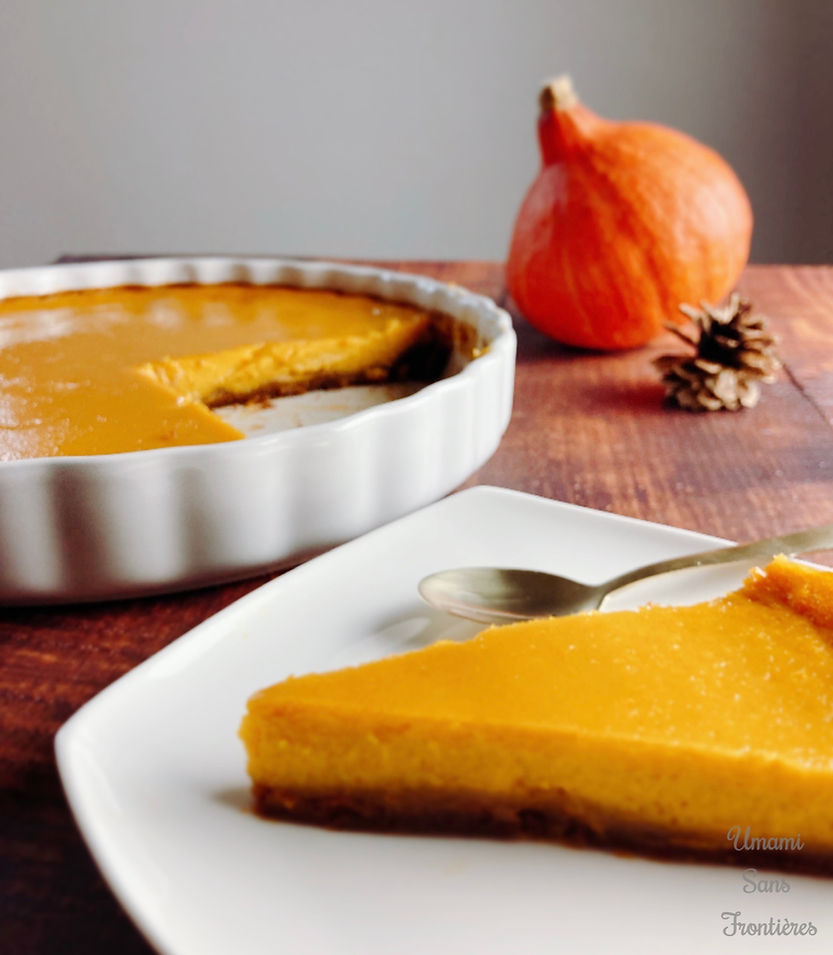 Pumpkin tart on a plate, spoon, pumpkin tart on a heat-resistant plate, pumpkin, pine cone