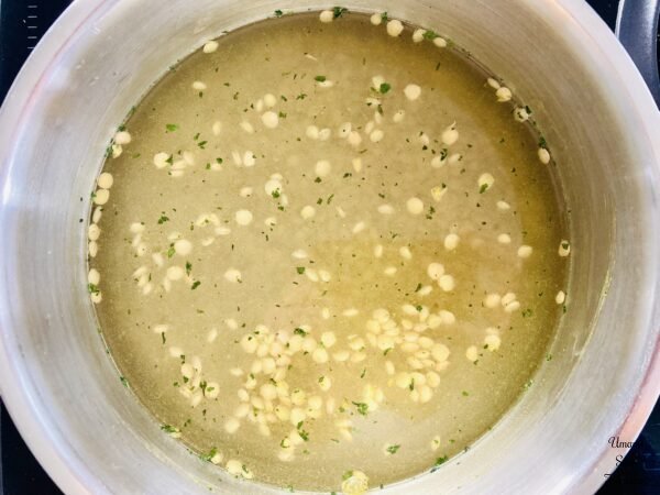 Linsensuppe lentils hot water bouillons in a pot