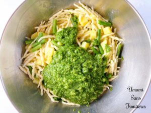 Pasta Pesto pasta torofie potatoes green beans and basil sauce in a bowl