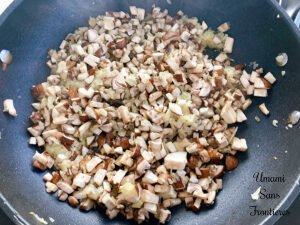 Pasta alla boscaiola cremosa mushroom onion butter in a frying pan