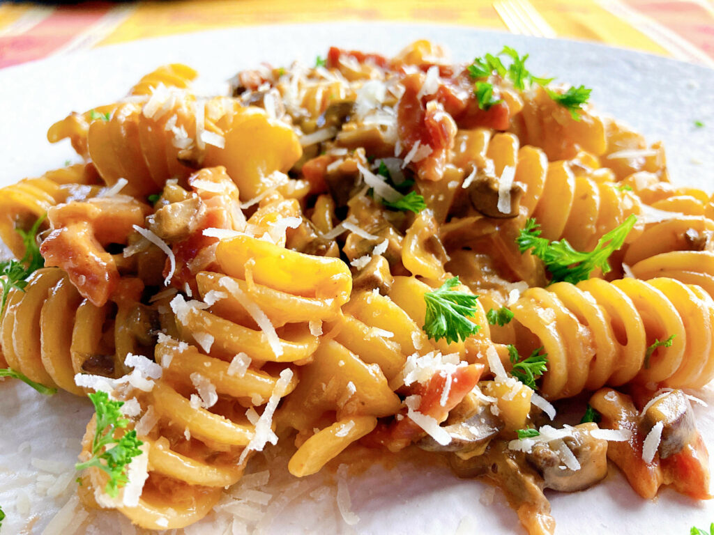 Pasta alla boscaiola cremosa mushroom and bacon tomato cream pasta parsely