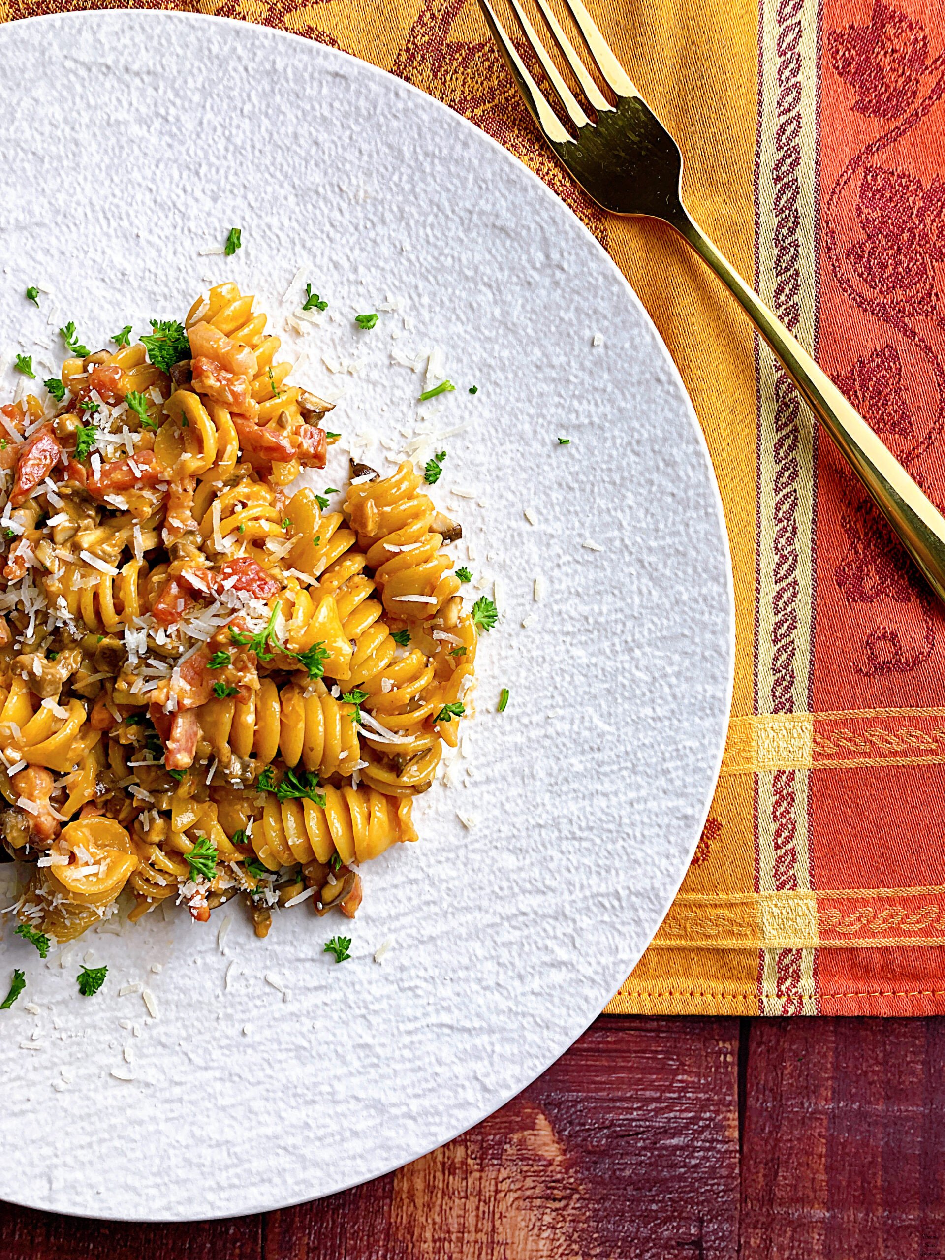 Pasta alla boscaiola cremosa mushroom and bacon tomato cream pasta fork