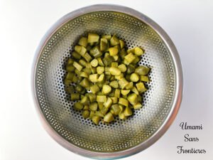 Solyanka pickles in a colander