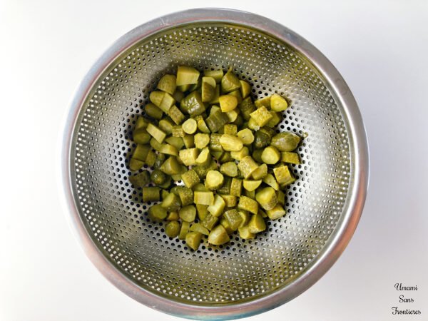 Solyanka pickles in a colander