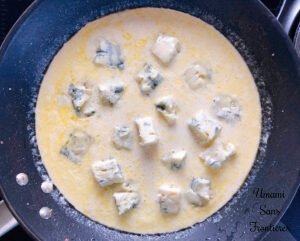 Tortellini butter heavy cream gorgonzola cheese in a frying pan