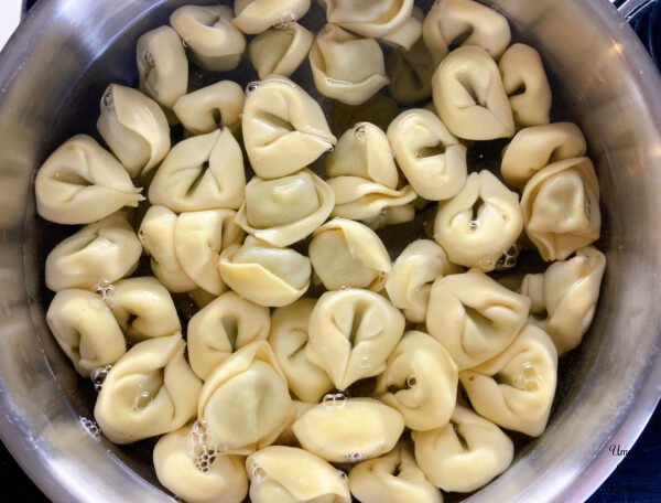 Tortellini tortellini in a hot water