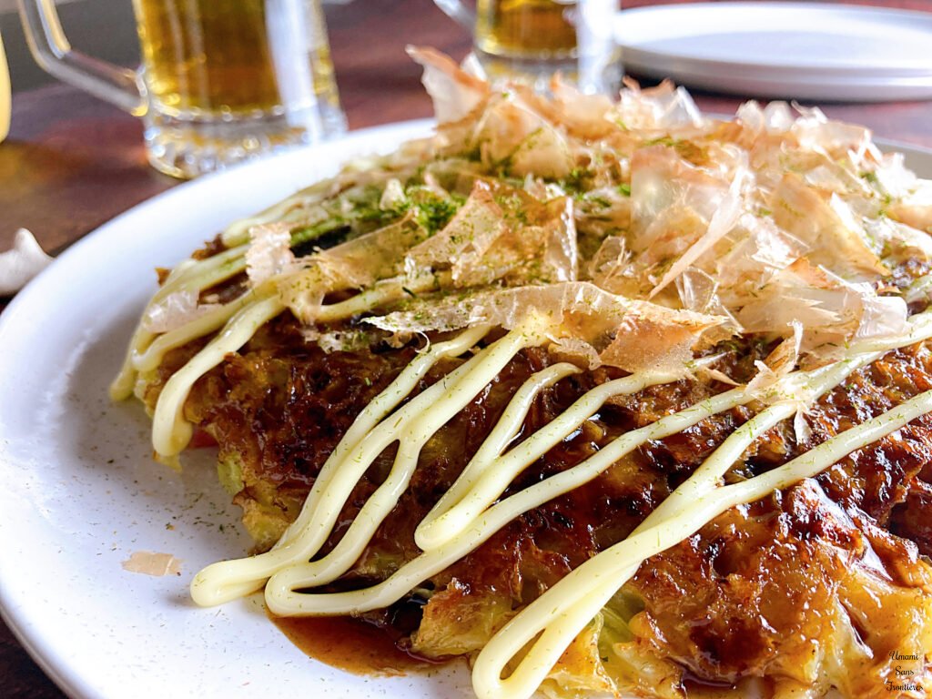 Okonomiyaki okonomiyaki sauce mayonnaise katsuobushi aonori beer