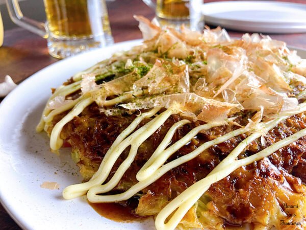 Okonomiyaki okonomiyaki sauce mayonnaise katsuobushi aonori beer