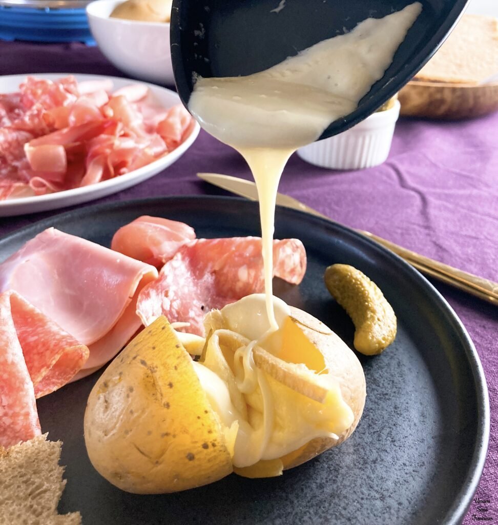 Raclette cheese potatoes Cured meats cornichon 