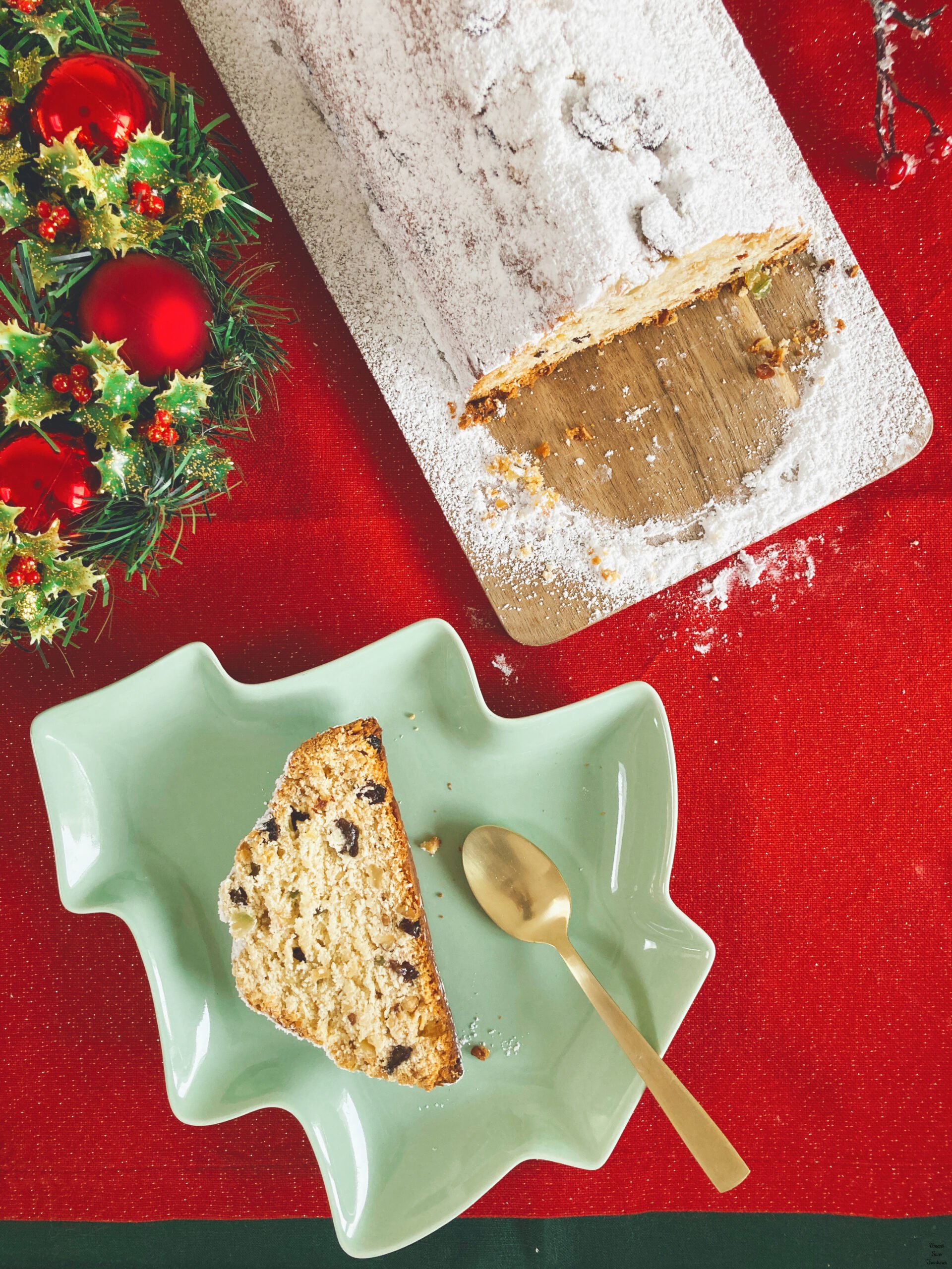 Stollen stollen on the wooden plate piece of stollen on a plate