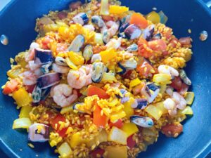 Seafood Paella Onion Bell pepper Tomato Tomato paste turmeric salt Frozen seafood mix