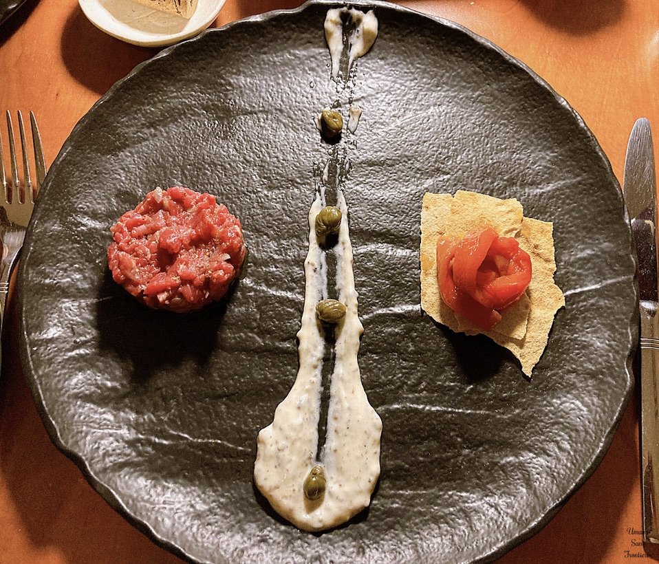 beef tartare (Tartare di Manzo)roasted red pepper pane carasaucapers and sauce