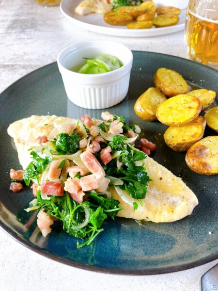 White Fish with Bacon Onion Parsley – Finkenwerder Style blue plate cucumber salad baked potatoes