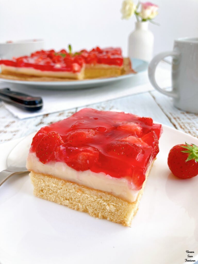 German strawberry cake cup a strawberry spoon