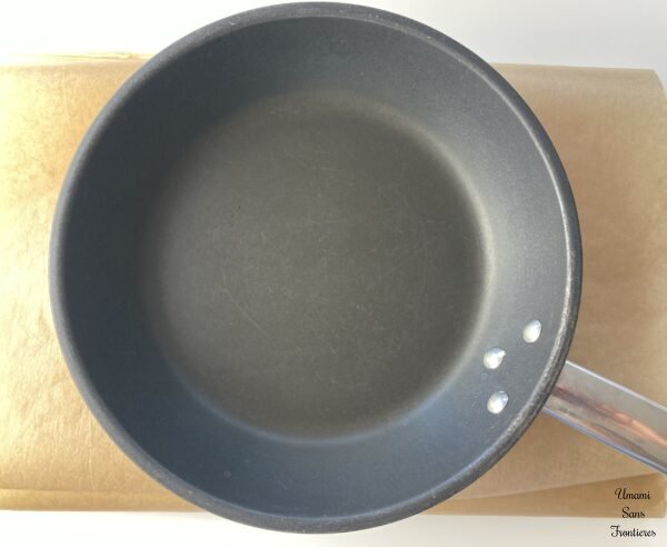 frypan on the pork covered paper