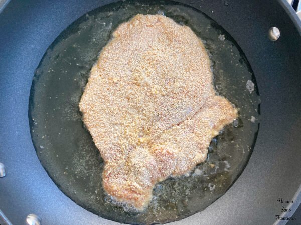 Pork olive oil in the frypan 