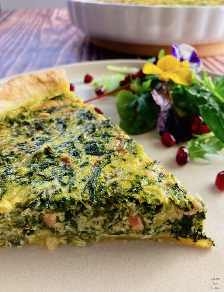 piece of spinach and bacon quiche