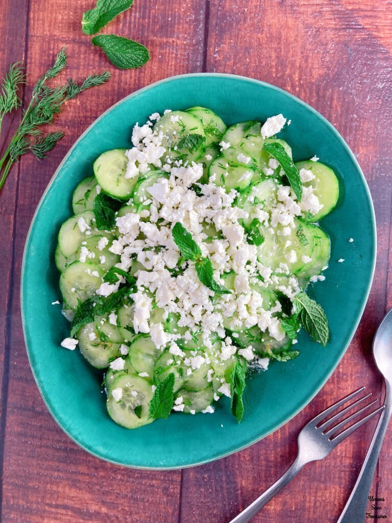 Cucumber salad mint feta cheese dill spoon fork