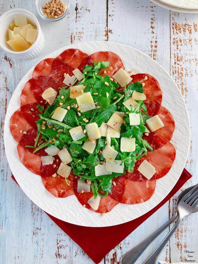 Italian Salad with Prosciutto, Arugula, and Grana Padano nuts salt pepper balsamic vinegar olive oil