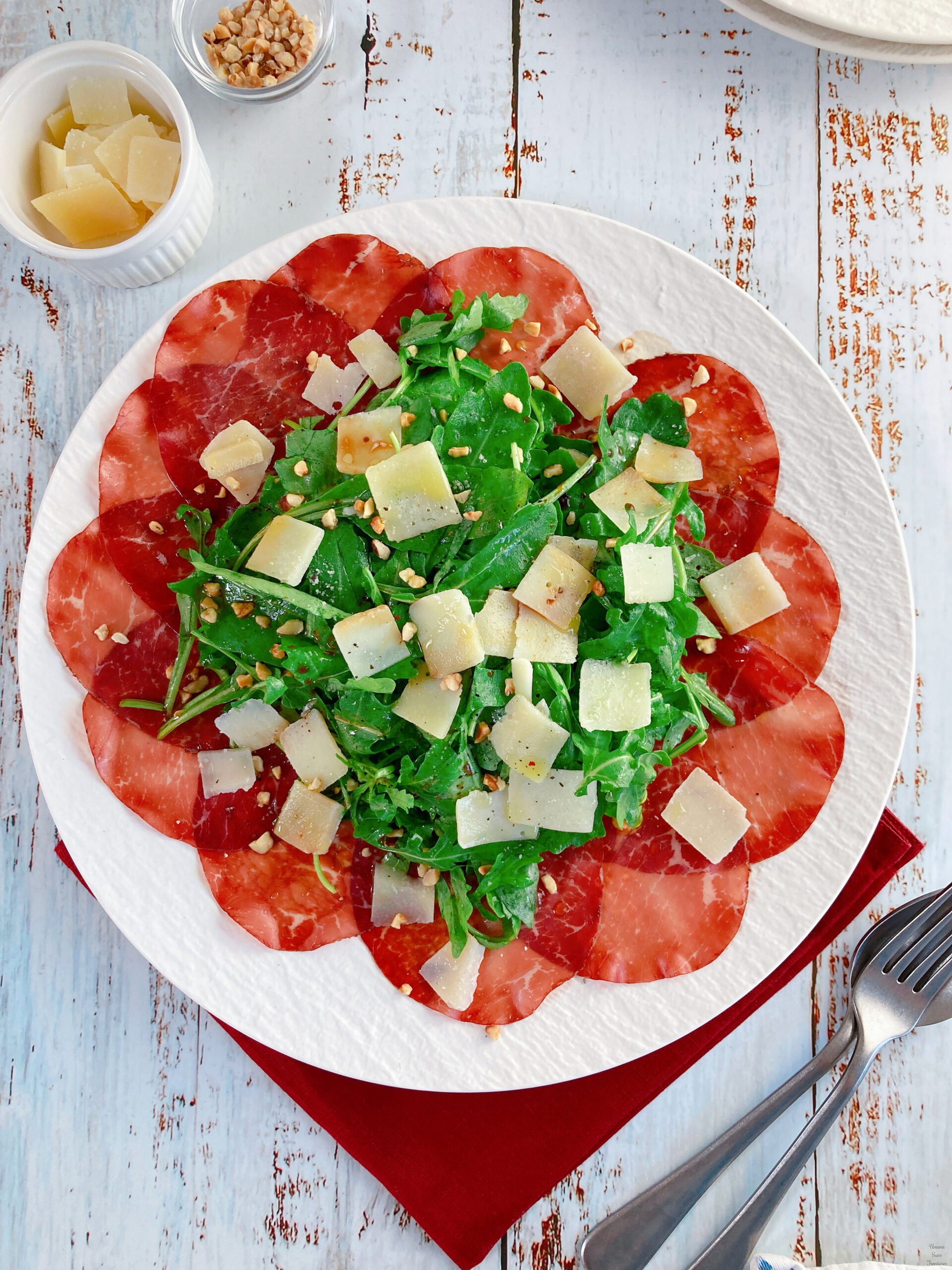 Italian Salad with Prosciutto, Arugula, and Grana Padano nuts salt pepper balsamic vinegar olive oil