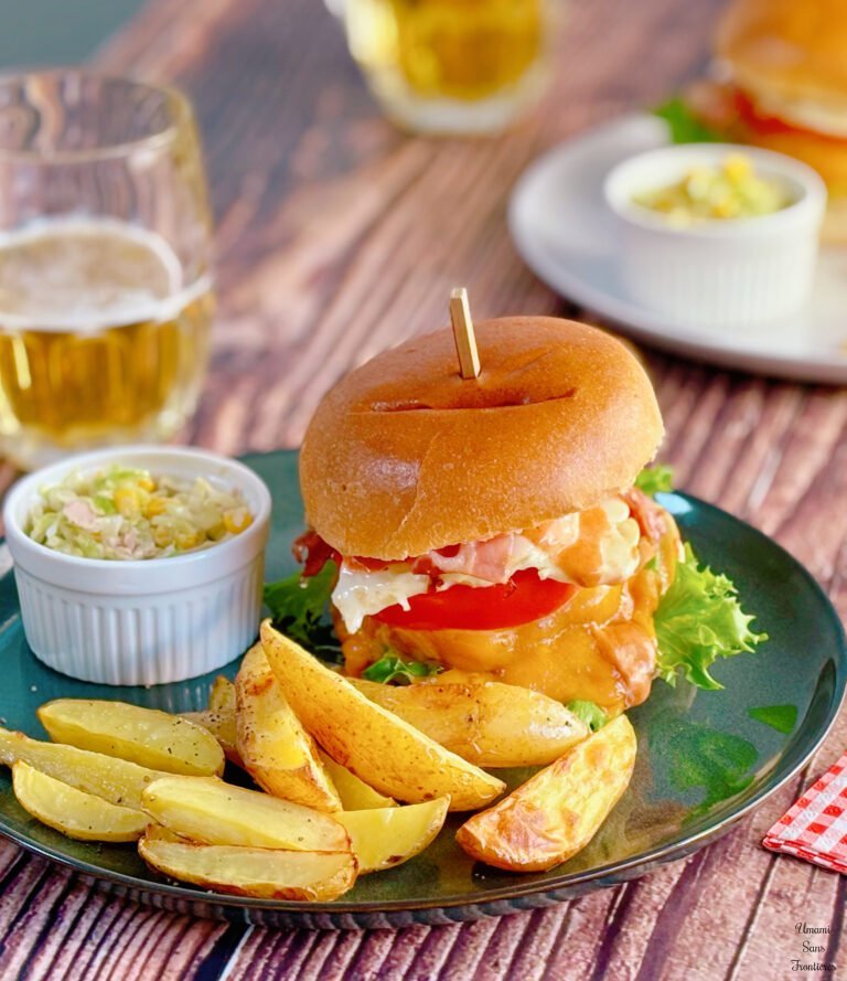 Bismarck-Style Burger French fried potatoes coleslaw salad beer