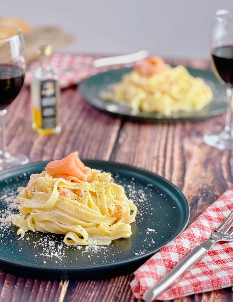 pasta cream sauce smoked salmon cheese red wine truffe oil fork