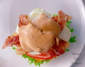 bacon and sauce on top