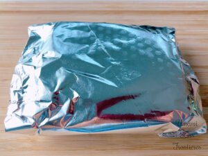 pork fillet covered with foil