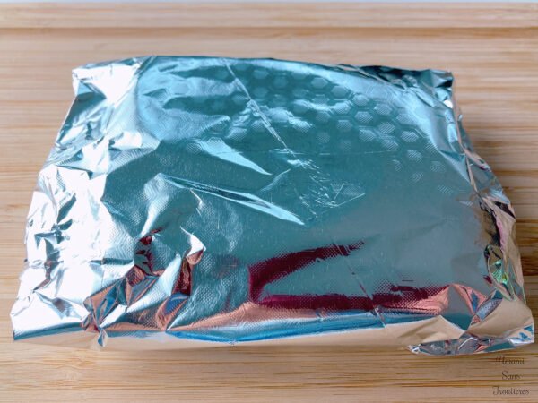 pork fillet covered with foil