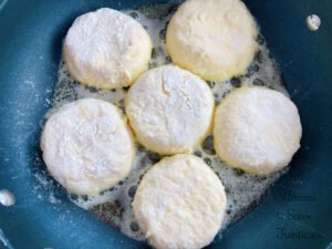 Syrniki butter in frypan
