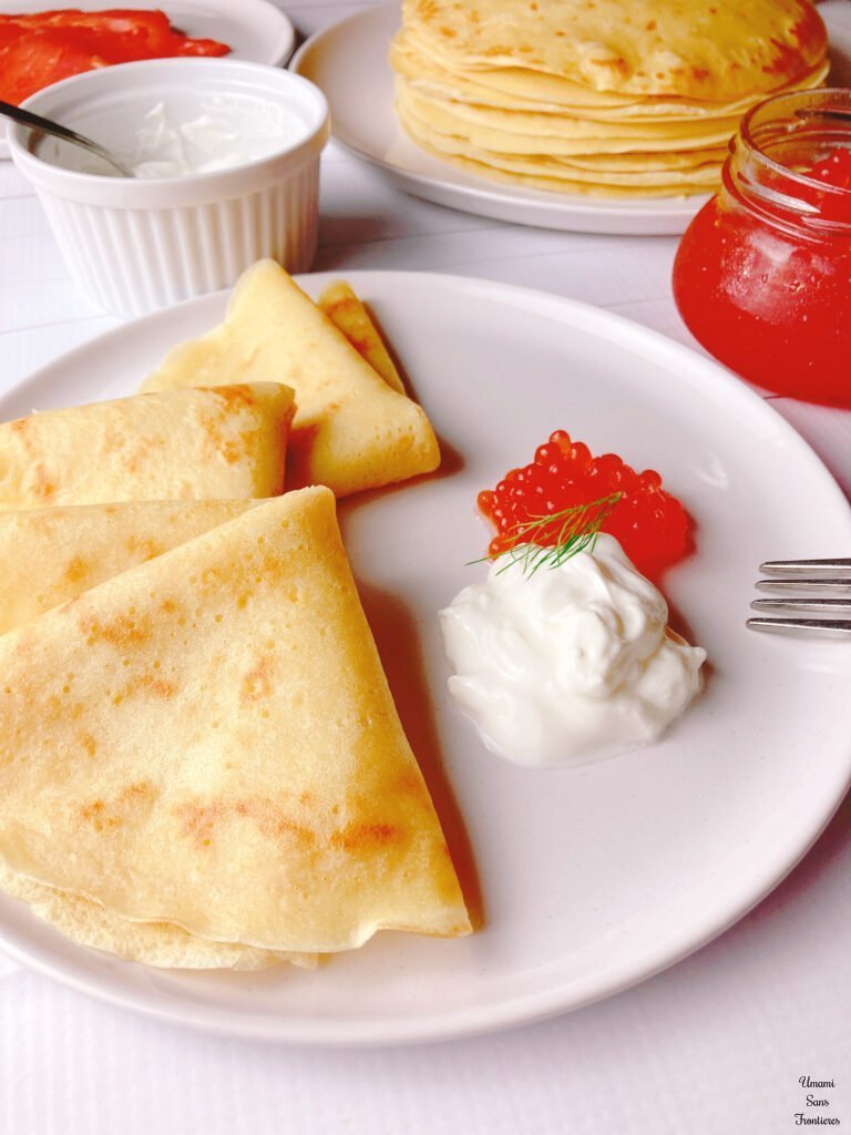 Russian blini, sour cream caviar fork dill