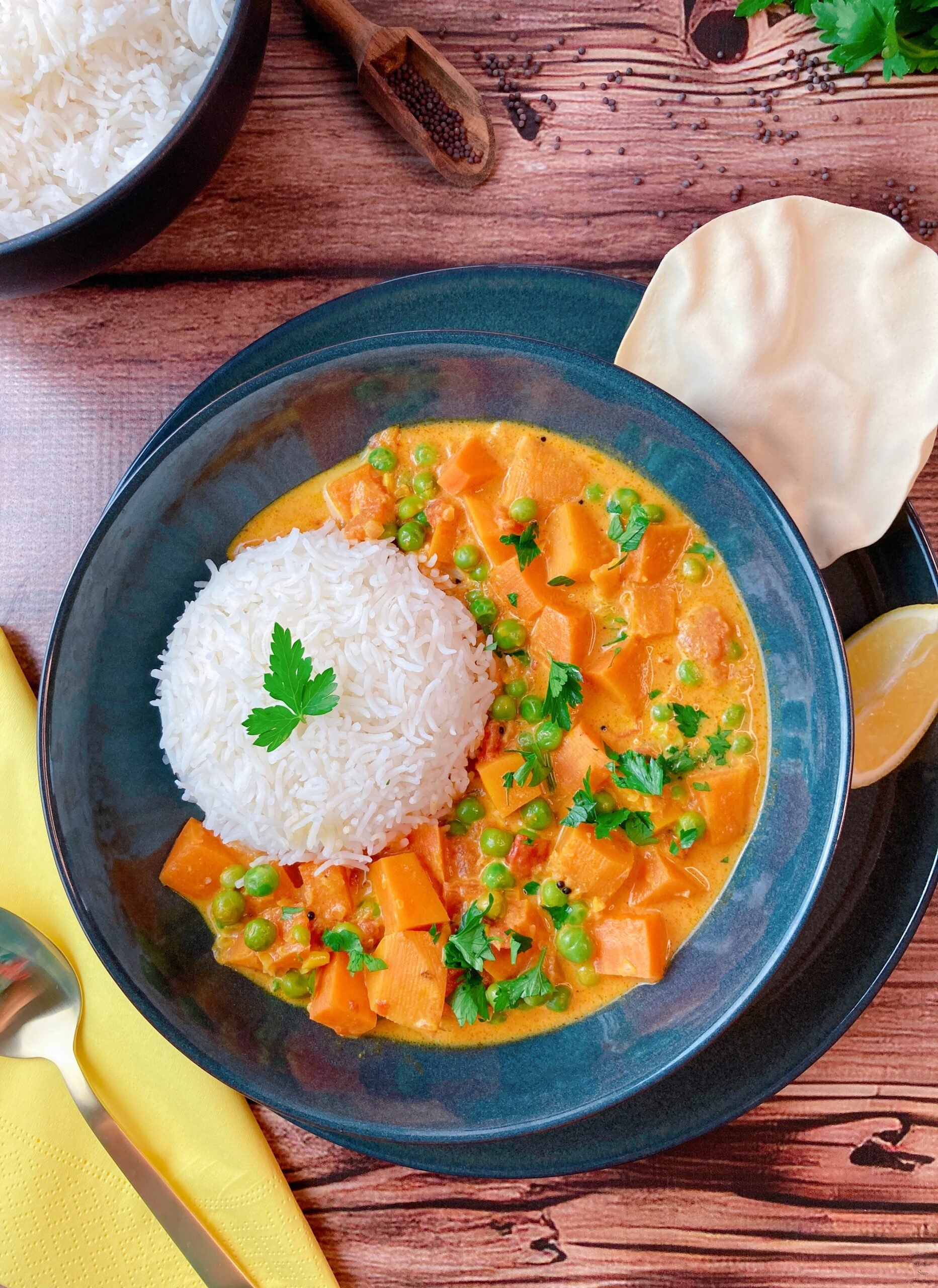South Indian sweet potato curry rice spoon parsley black mustard seeds