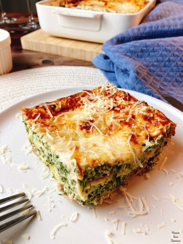 piece of spinach ricotta bacon lasagna fork