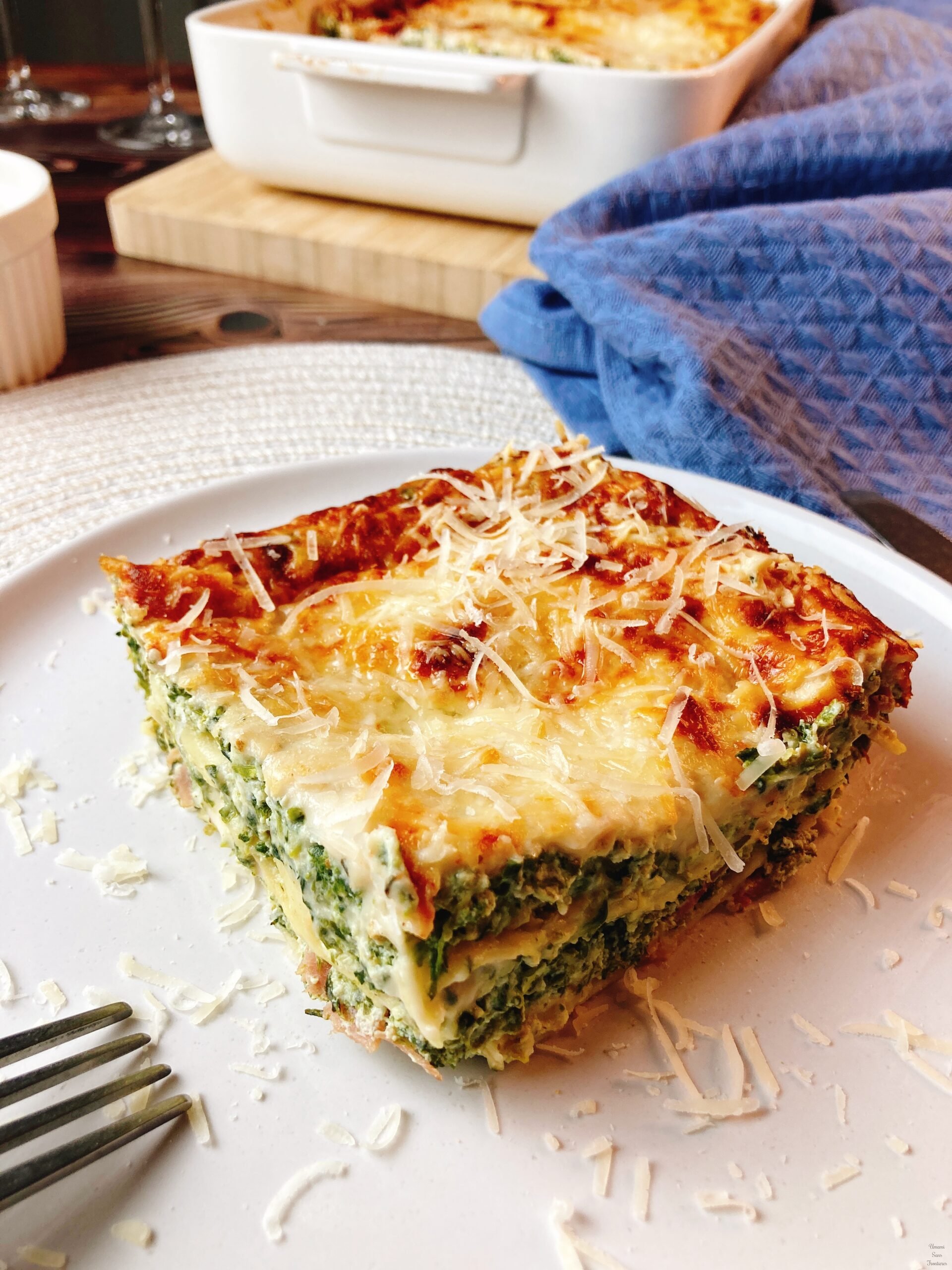 piece of spinach ricotta bacon lasagna fork