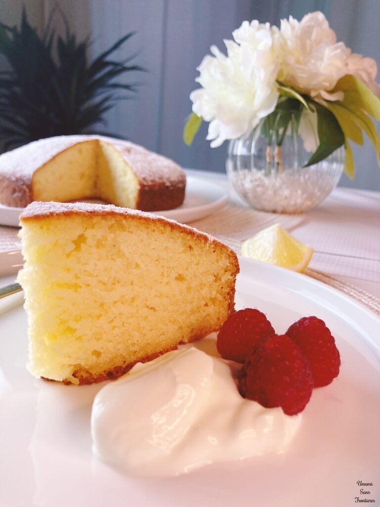 Lemon ricotta cake a piece of cake berries creme fraiche flowers