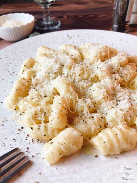 Gnocchi fork cheese pepper white wine
