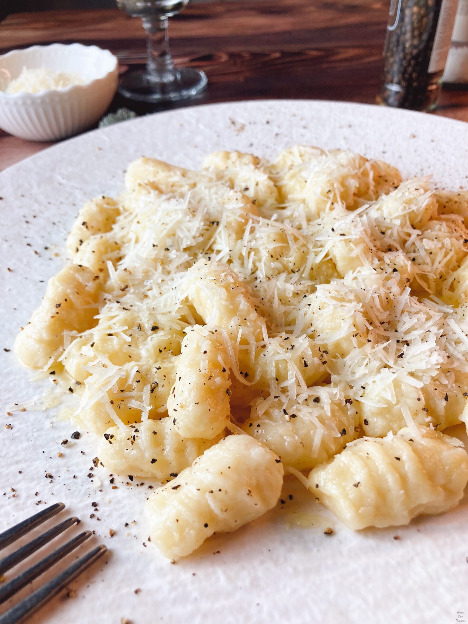 Gnocchi fork cheese pepper white wine