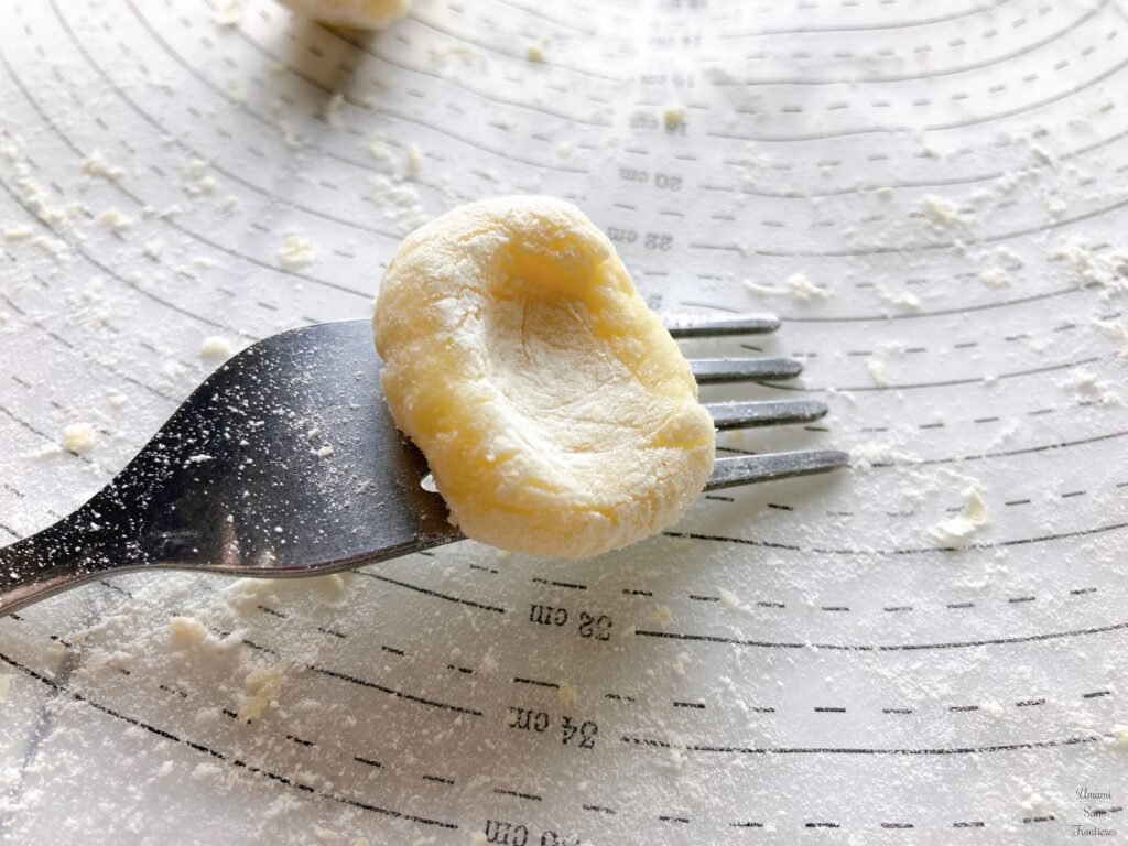 fork a piece of gnocchi