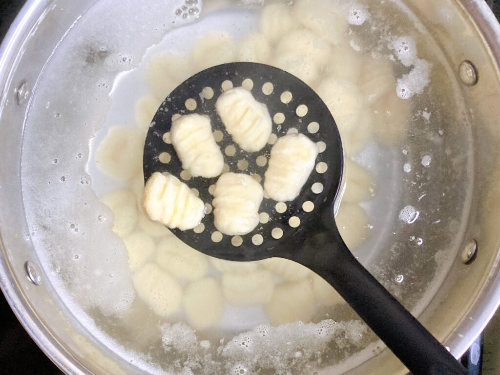 gnocchi on the slotted spoon