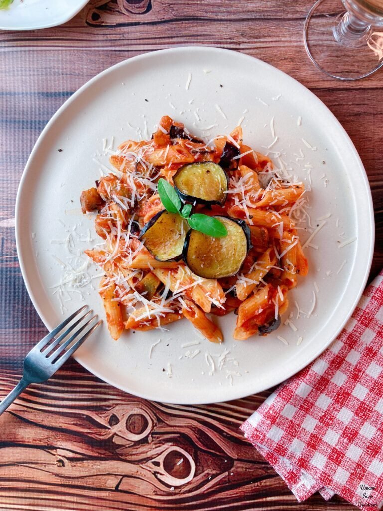Eggplant Tomato Pasta fork white wine napkin