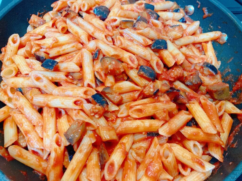 add pasta in tomato sauce